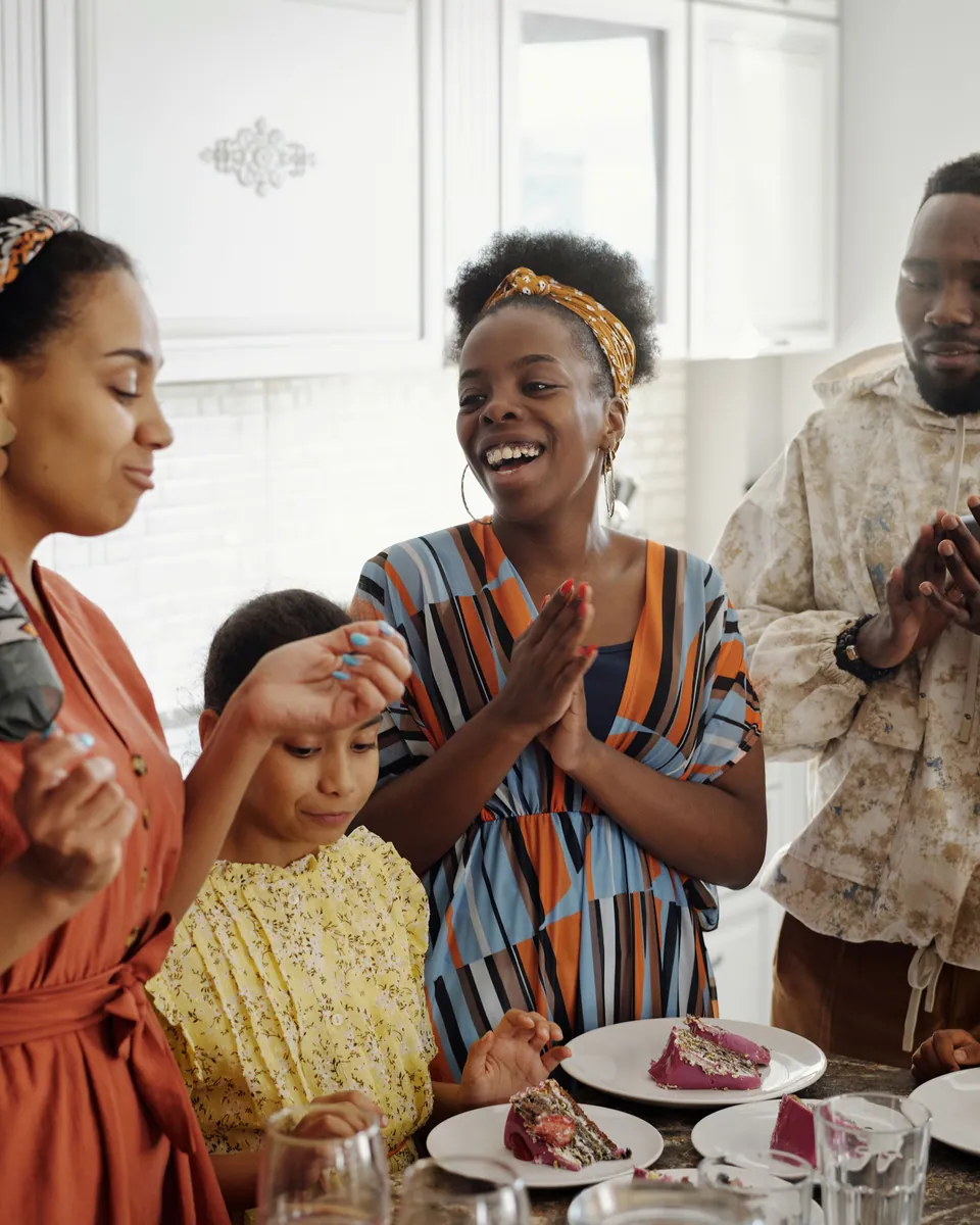 Family sharing a personal birthday moment