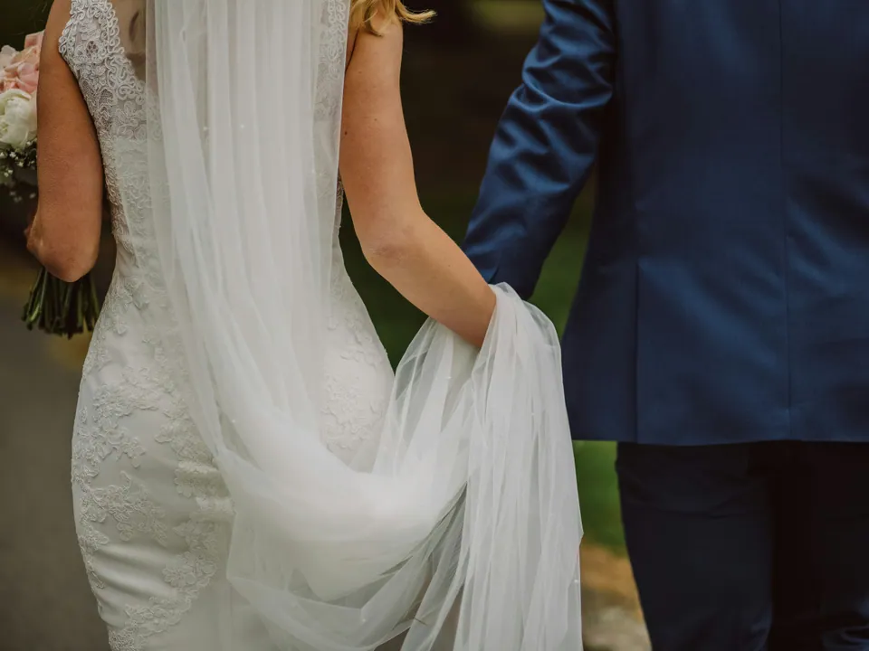 Newlyweds sharing a natural wedding moment